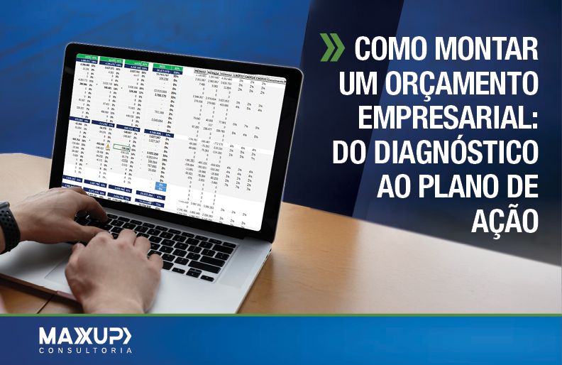 Executivo analisando planilhas financeiras em notebook — representando o processo de como montar um orçamento empresarial com método e controle — MaxUp Consultoria.